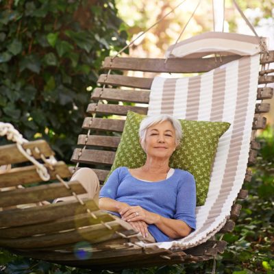 A woman relaxing on a hammock